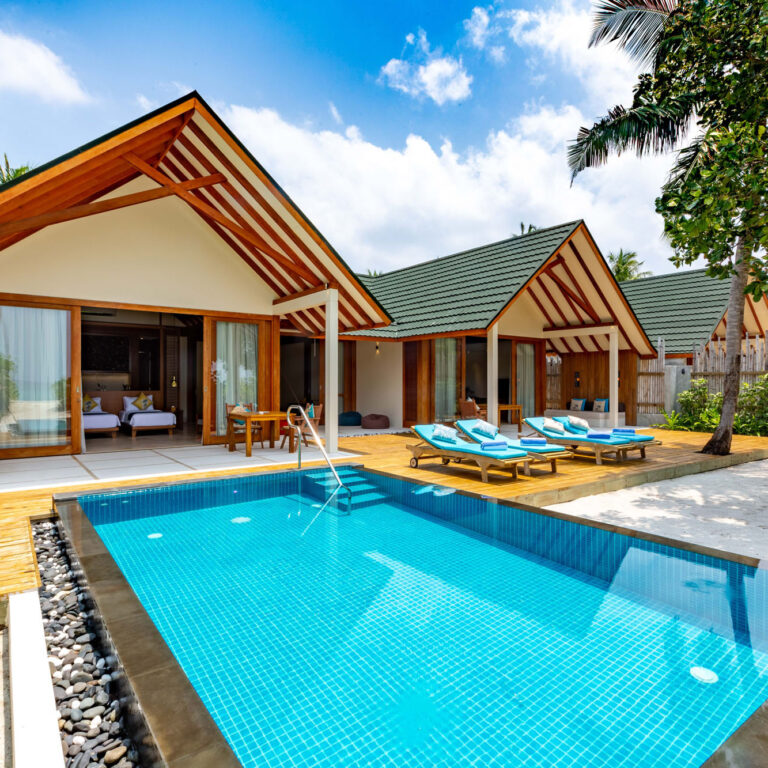 BeachResidence_Deck_2 Facade view of private pool and Beach Residence at Furaveri Maldives