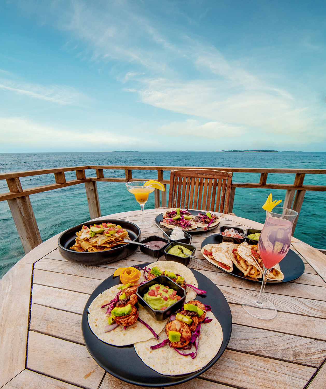 Dining at Furaveri Maldives Resort – World-Class Island Cuisine Dining experience at Furaveri Maldives Resort featuring beachfront restaurants, international cuisine, and oceanfront dining in the Maldives