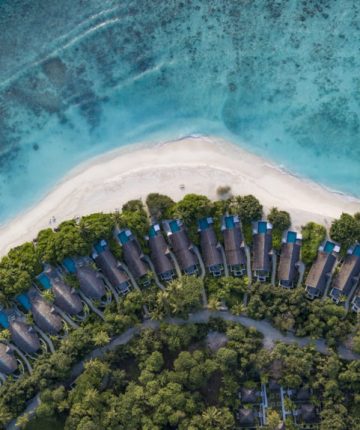 Birds-eye view of Furaveri Maldives Resort showcasing its stunning surroundings and luxurious accommodations